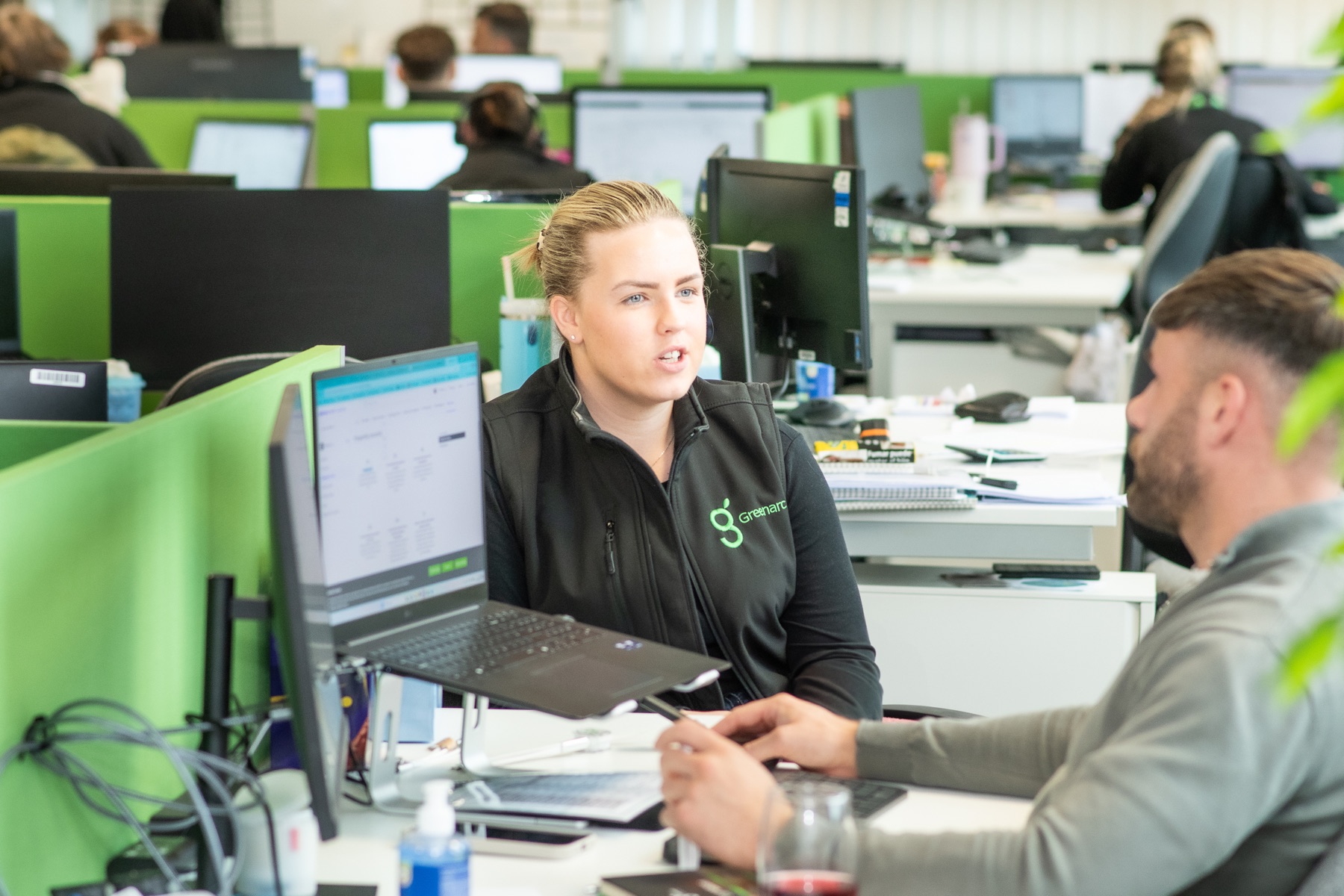 Greenarc Fuel Cards colleagues working together in the Padiham office